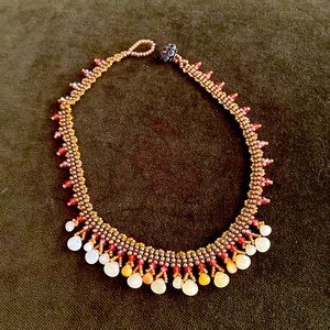 Handmade beautifully crafted choker style necklace with crystal clasp.